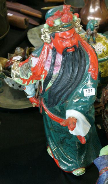 Appraisal: A porcelain figure of a Chinese deity cm high together