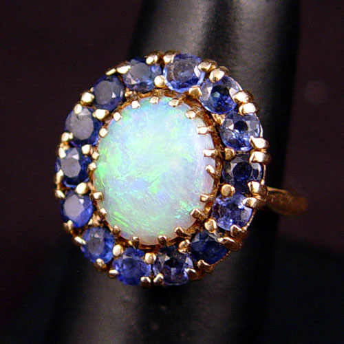 Appraisal: K OPAL AND SAPPHIRE RING K yellow gold ring with