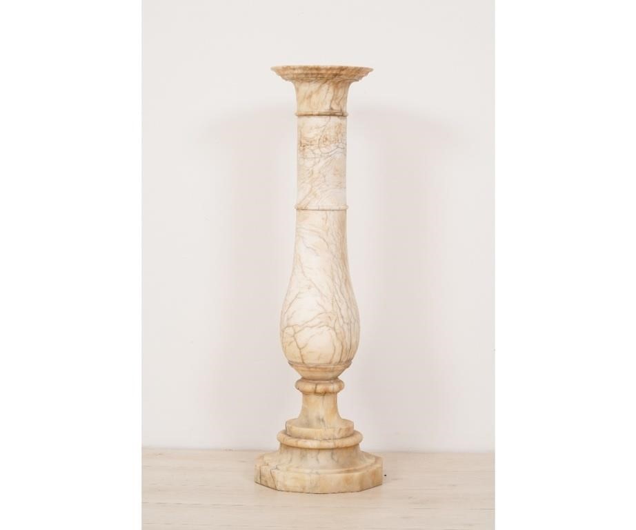 Appraisal: Hand carved variegated alabaster pedestal having a turned vase formed