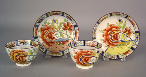 Appraisal: Two Gaudy Dutch cups and saucers th c the oyster