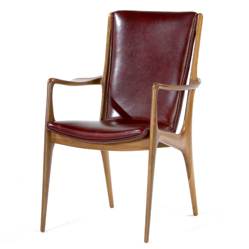 Appraisal: VLADIMIR KAGAN DREYFUSS Walnut armchair with red leather upholstery Branded