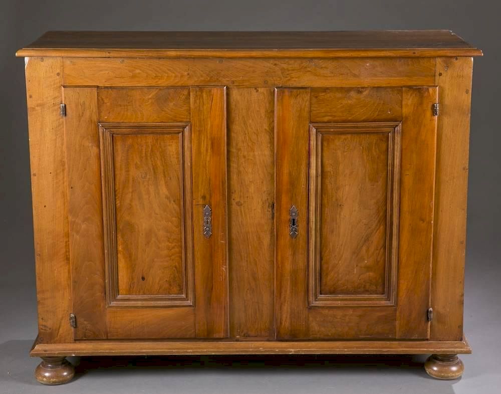 Appraisal: French cabinet A French cabinet Solid hardwood with blind doors