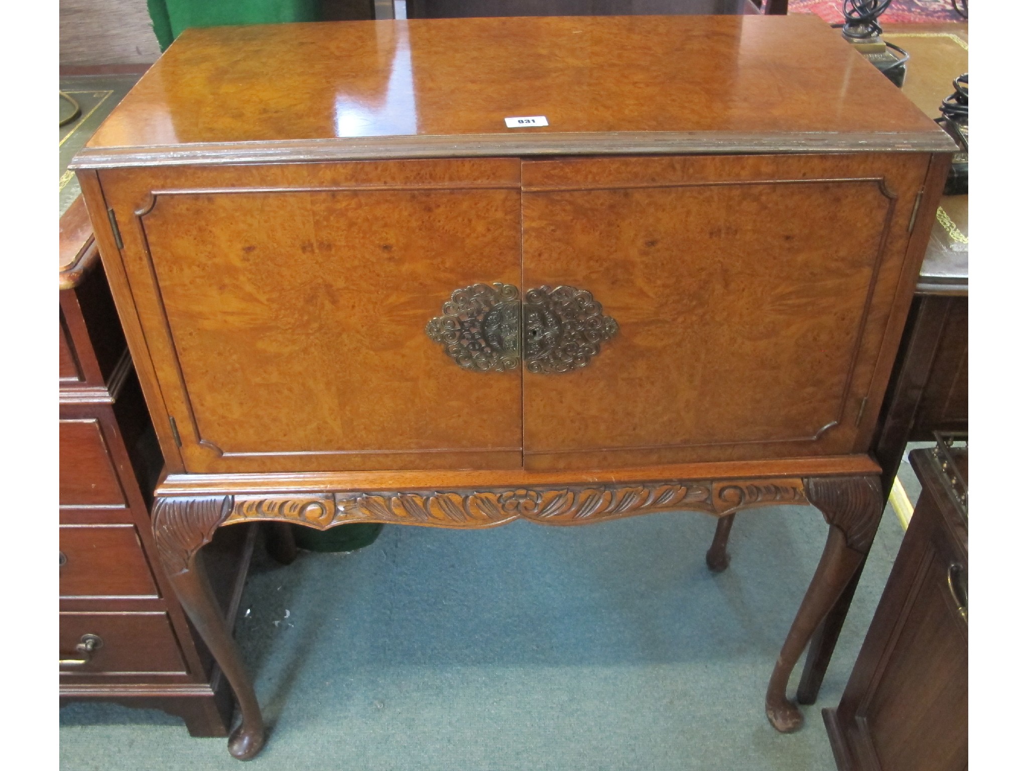 Appraisal: A walnut drinks cabinet