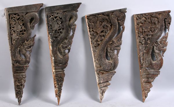 Appraisal: Group of four carved Thai arch fragments l x w