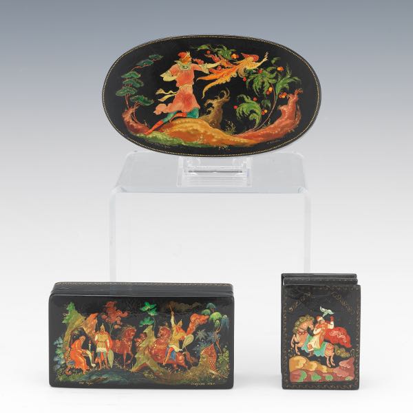 Appraisal: THREE RUSSIAN LACQUER BOXES Three lacquer boxes depicting fairytales one