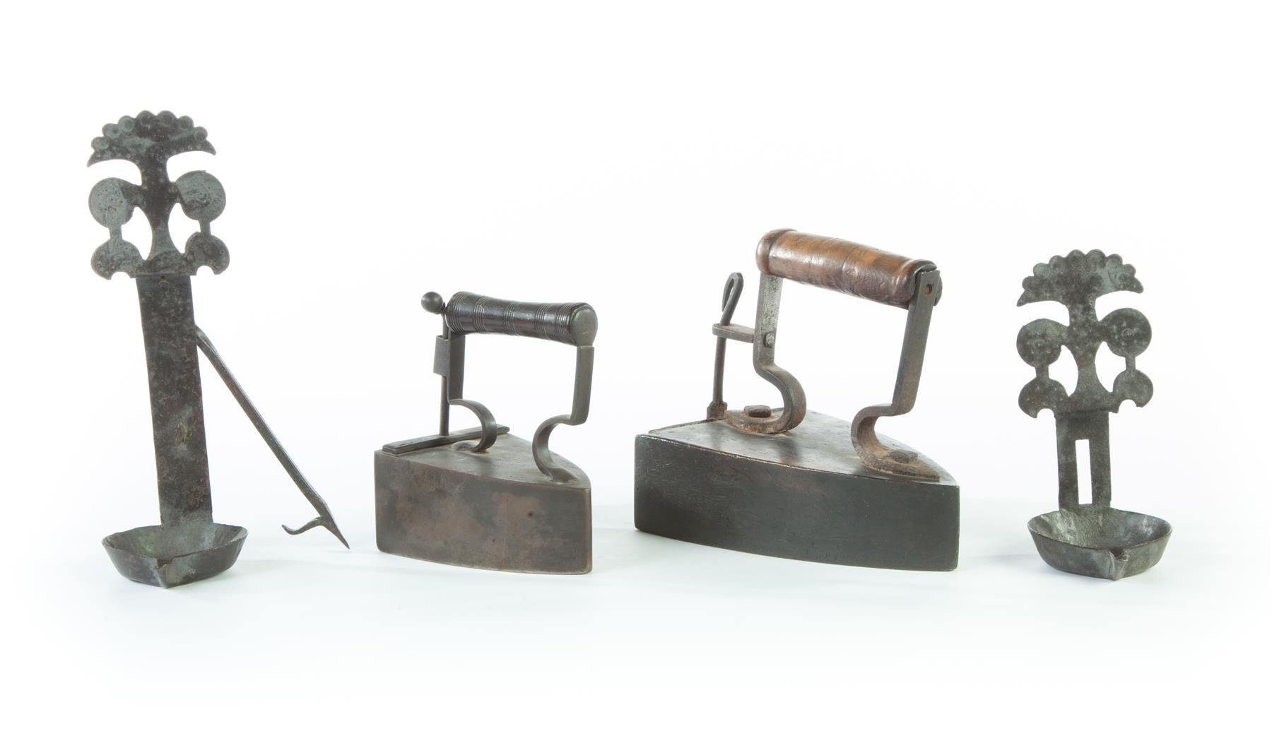 Appraisal: TWO AMERICAN SAD IRONS AND CRUSIE LAMP Late th-early th