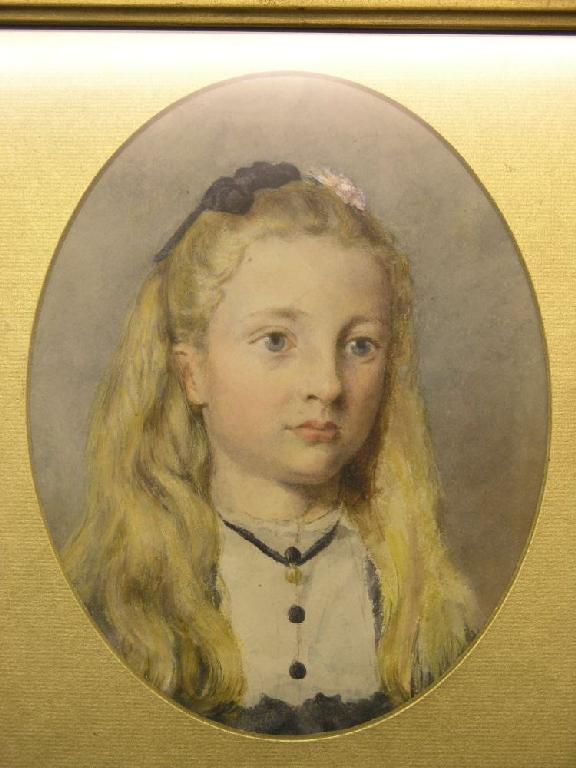 Appraisal: A Victorian oval watercolour portrait bust of a young girl