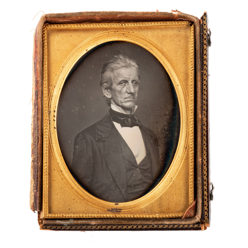 Appraisal: EARLY PHOTOGRAPHY - PORTRAITURE Quarter plate half portrait of a