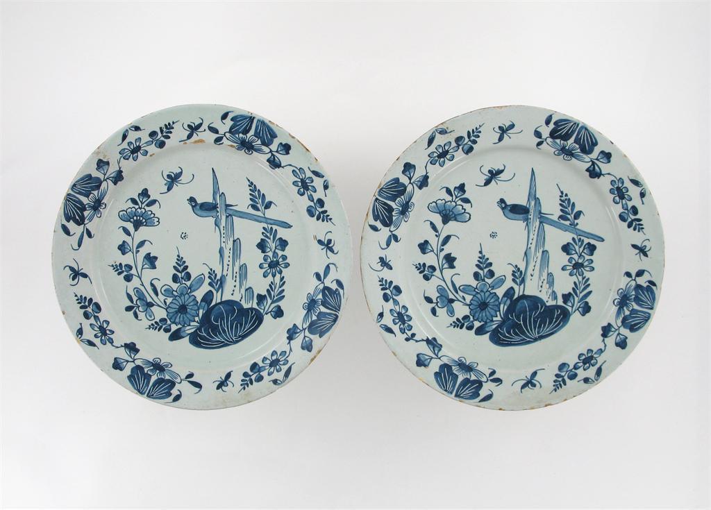 Appraisal: A pair of Delft blue and white plates