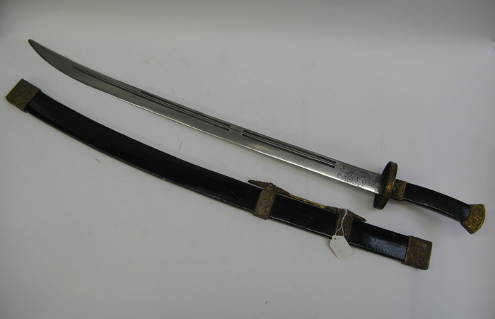 Appraisal: A CHINESE SWORD with original ebonized wood scabbard The blade