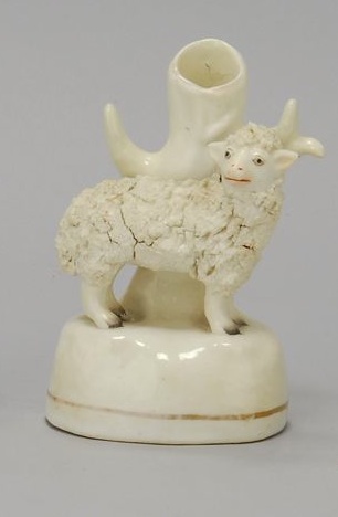 Appraisal: ROCKINGHAM SHEEP-FORM SPILL Circa In white with gold line decoration