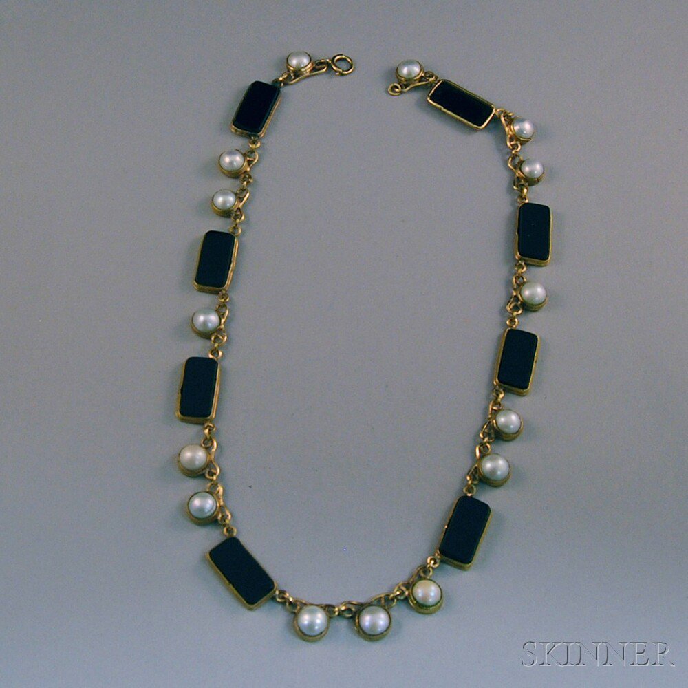 Appraisal: Gold Onyx and Split Pearl Necklace designed as bezel-set onyx