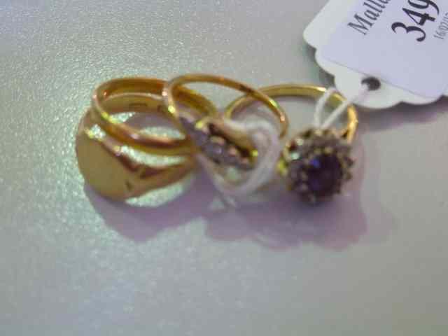 Appraisal: FOUR VARIOUS RINGS including a ct gold wedding band an