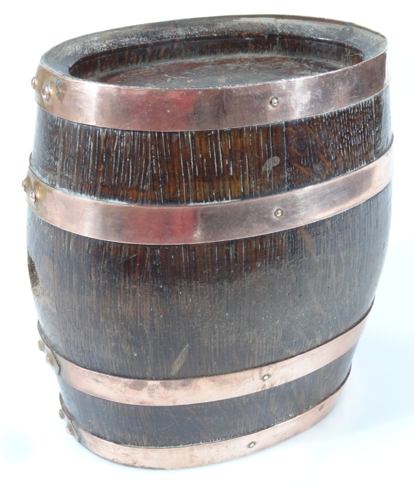 Appraisal: An early thC oak coopered barrel of oval outline with