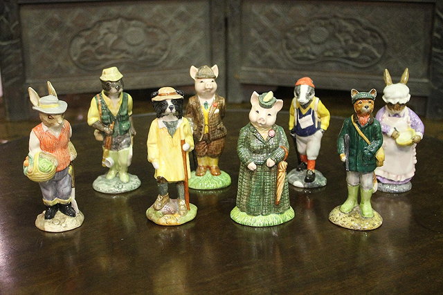 Appraisal: A COLLECTION OF EIGHT BESWICK FIGURES to include Gentleman Pig