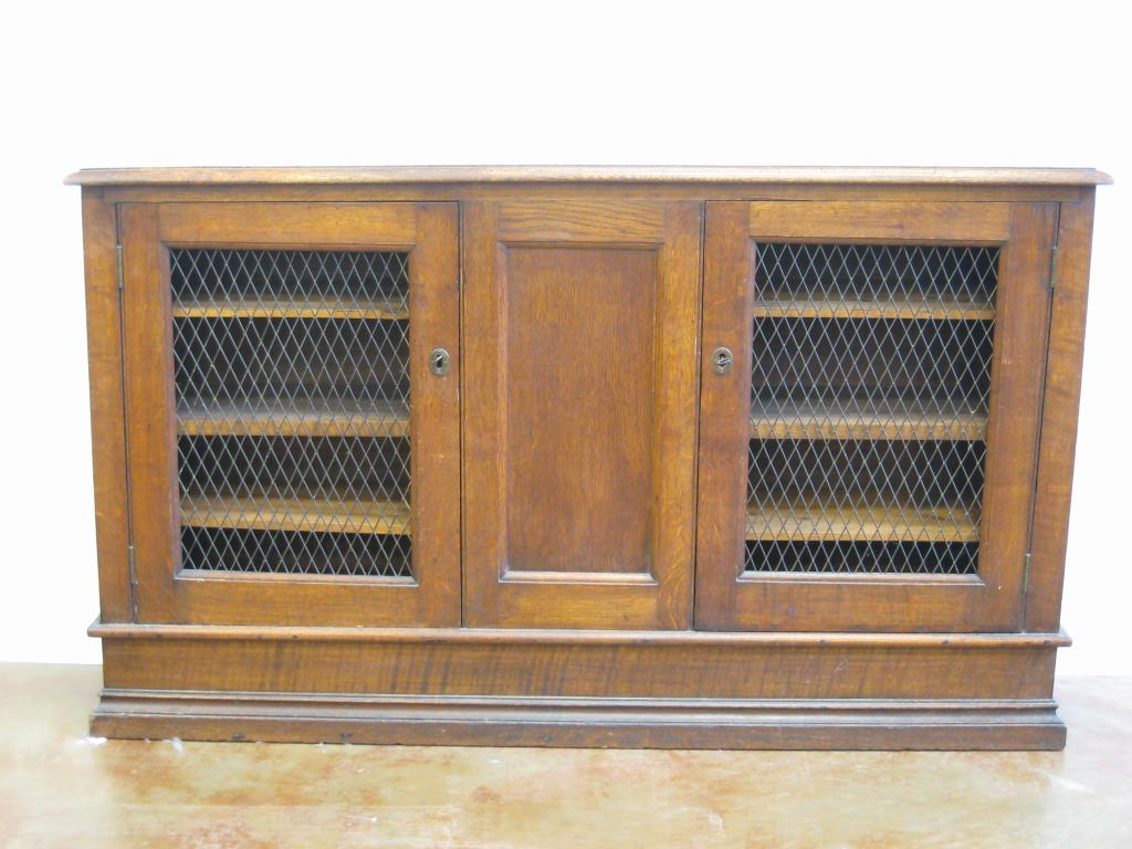 Appraisal: A th Century oak low Bookcase with pair of doors