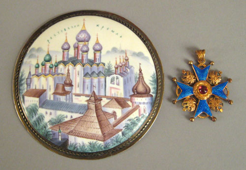 Appraisal: Russian painted enamel of the Kremlin together with a silver