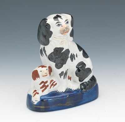 Appraisal: A Good King Charles Spaniel Figural Seated black and white