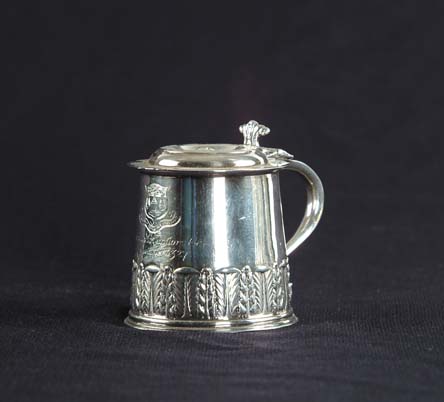 Appraisal: MINIATURE ENGLISH STERLING TANKARD Front crest and inscription Merchant Taylors