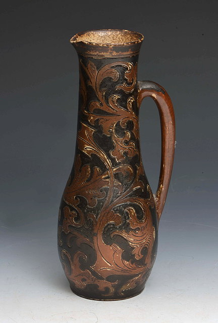 Appraisal: Martin BrothersJug black foliate scrolling motifsincised 'Martin Bros London Southall'