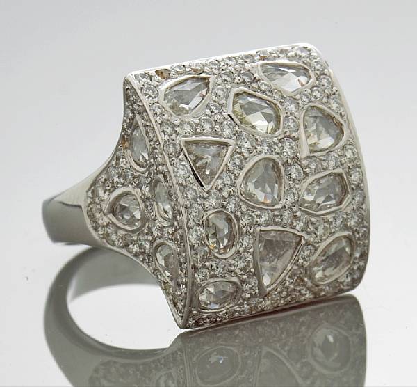 Appraisal: A diamond saddle ring estimated total diamond weight carats mounted