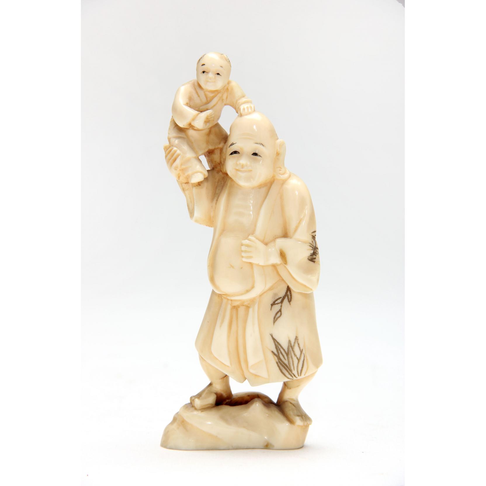 Appraisal: Japanese Ivory Okimono of a Portly Man Carrying a Boy