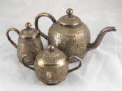 Appraisal: A Ceylon white metal tests silver three piece teaset of