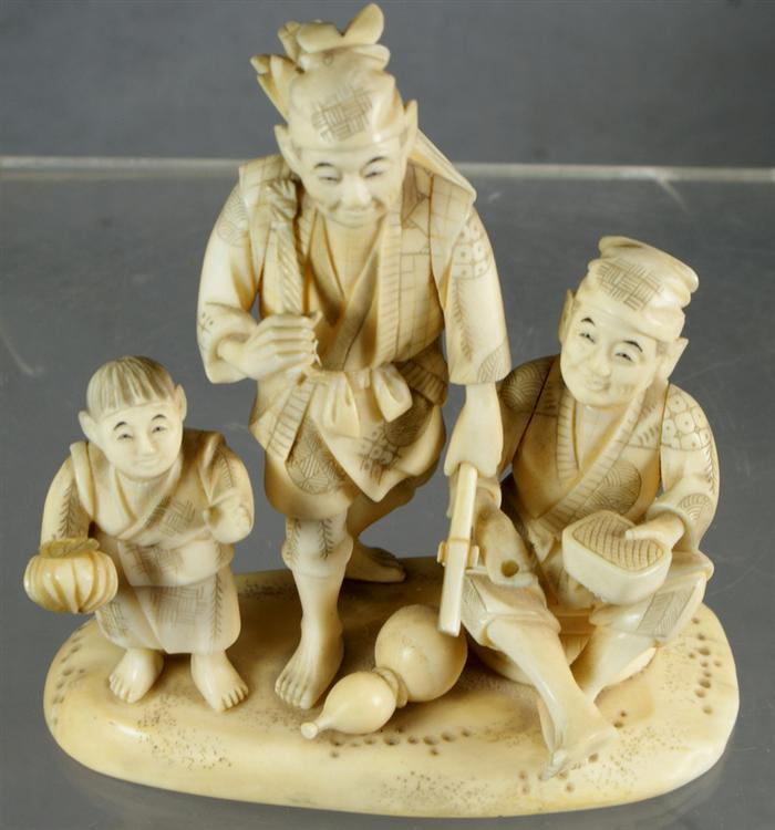 Appraisal: Carved ivory Japanese triple figurine men and a young boy