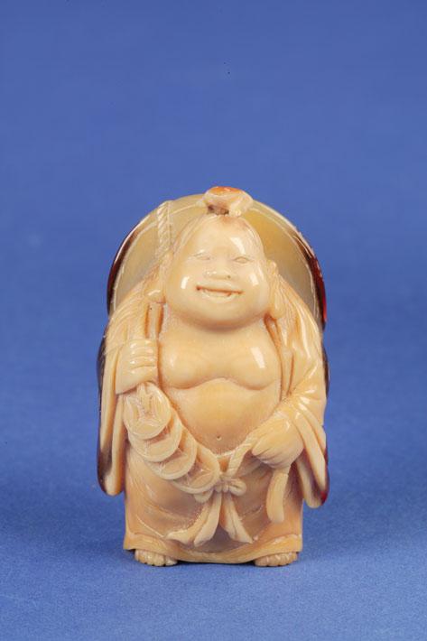 Appraisal: A CARVED HORNBILL IVORY BOTTLE in the form of a