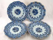 Appraisal: A set of four th c Chinese plates with wavy