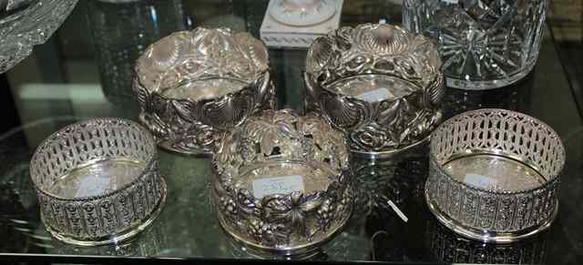 Appraisal: A PAIR OF WHITE METAL SHELL MOULDED WINE COASTERS diameter