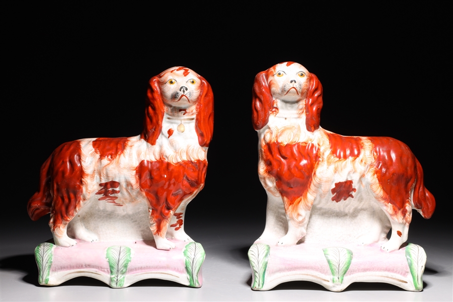 Appraisal: Pair of antique Staffordshire spaniels mid th century each with