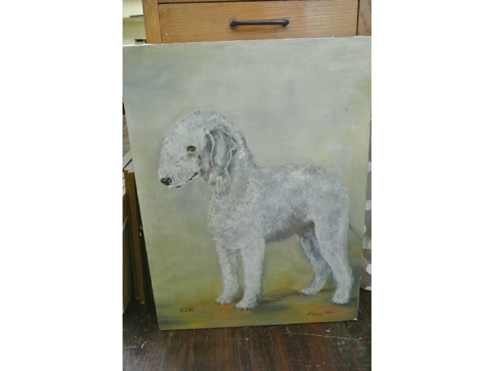 Appraisal: An oil painting on canvas of a Bedlington Terrier signed