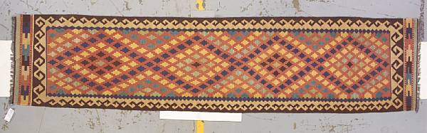 Appraisal: A Caucasian kilim runner size approximately ft in x ft