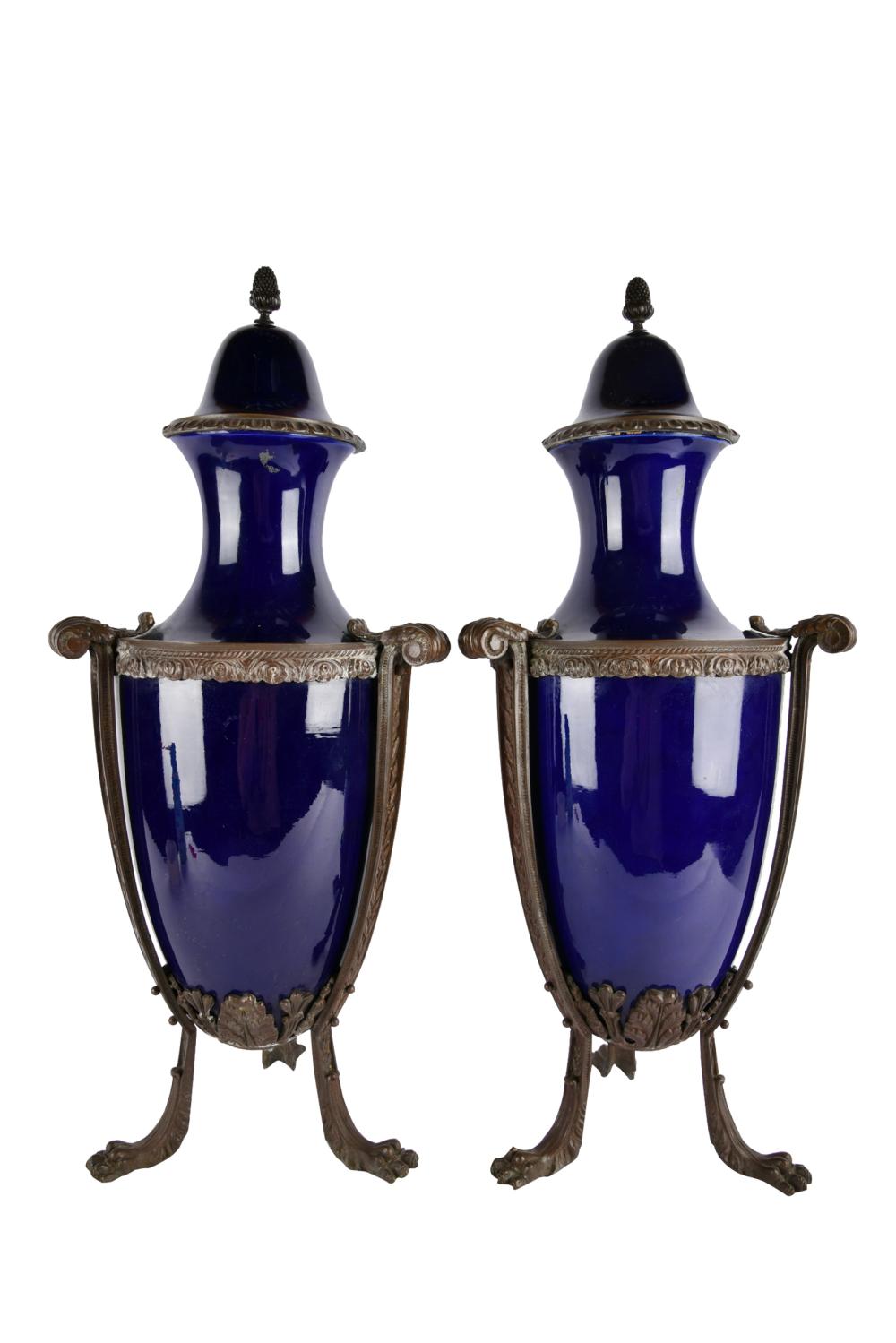 Appraisal: PAIR OF COBALT COVERED URNSporcelain each set in bronze base