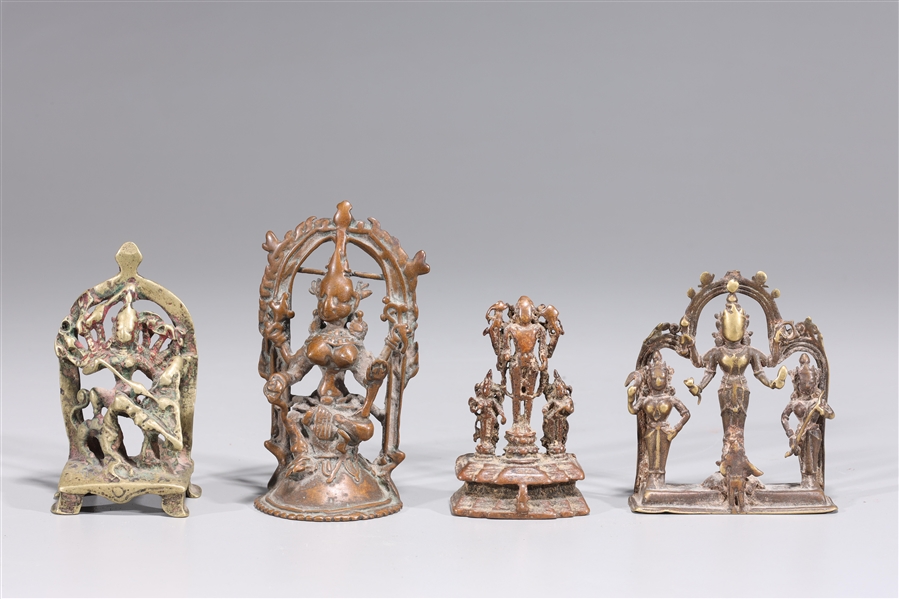 Appraisal: Group of four small antique Indian statues in gilt bronze