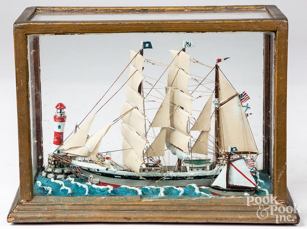 Appraisal: Painted sail ship and lighthouse ca Painted sail ship and