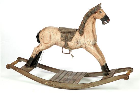 Appraisal: ROCKING HORSE American late th-early th century mixed woods Old