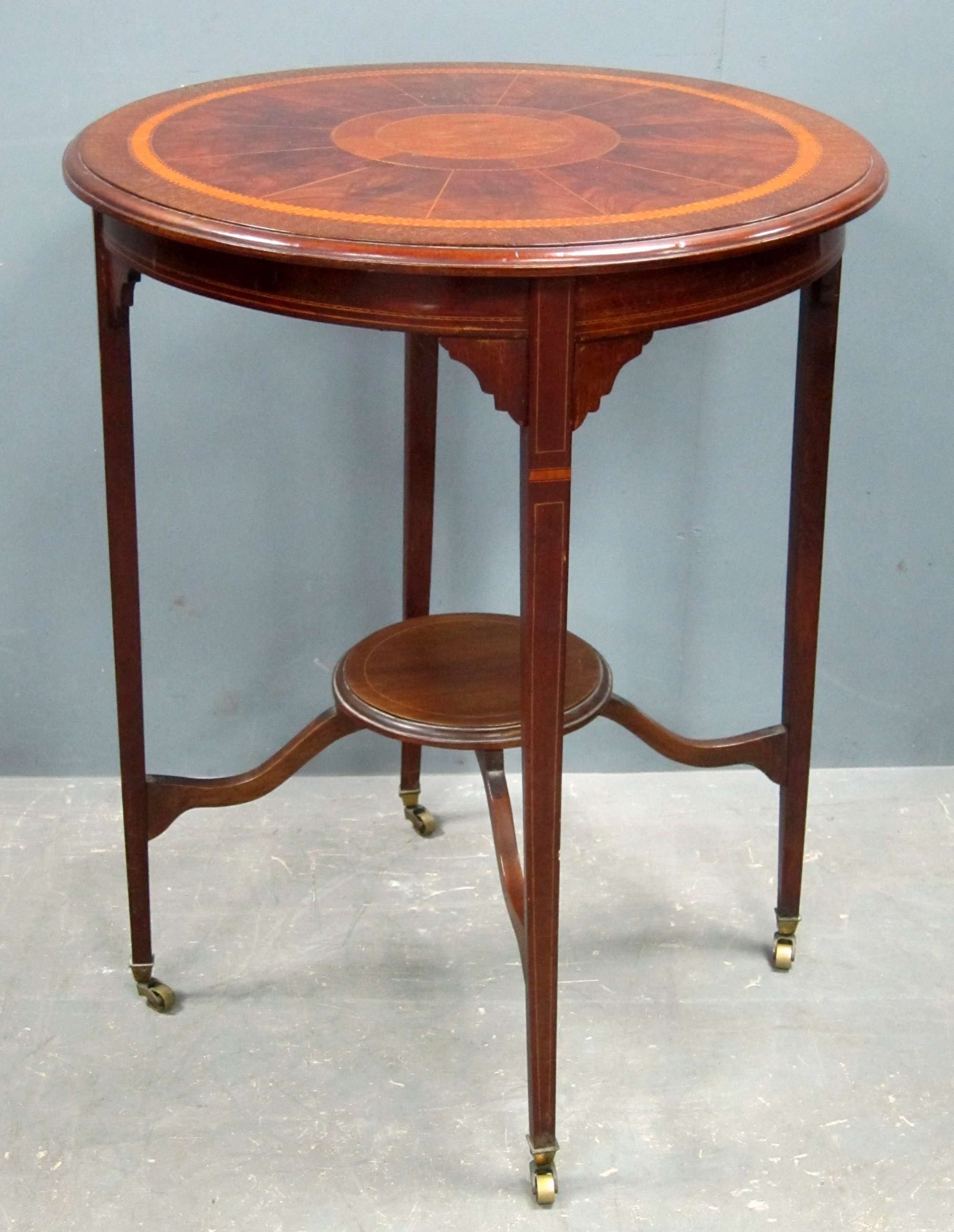 Appraisal: Edwardian mahogany circular inlaid occasional table on square legs and