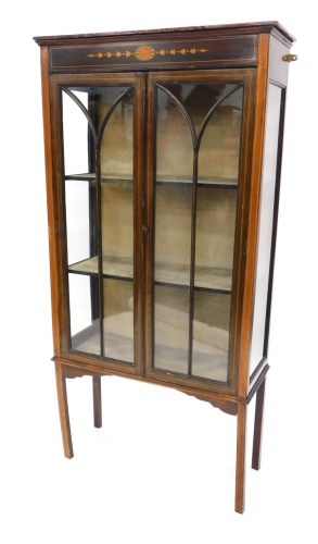 Appraisal: An Edwardian mahogany boxwood strung and painted display cabinet with