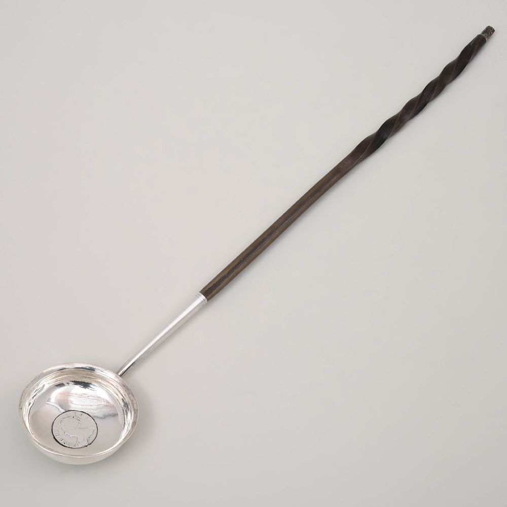 Appraisal: George III Silver Toddy Ladle Apparently unmarked with baleen handle