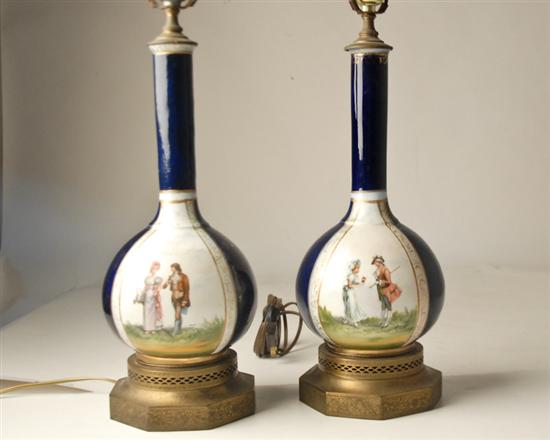 Appraisal: A Pair French Vasiform Porcelain Lamps with scenes of courting