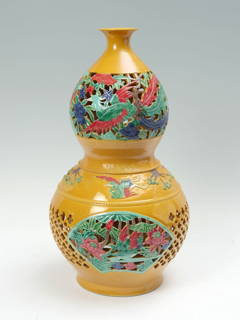 Appraisal: LARGE PIERCED CHINESE POLYCHROME DOUBLE GOURD VASE Large Chinese double