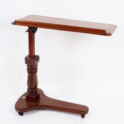 Appraisal: A William IV mahogany bed table circa the adjustable oblong