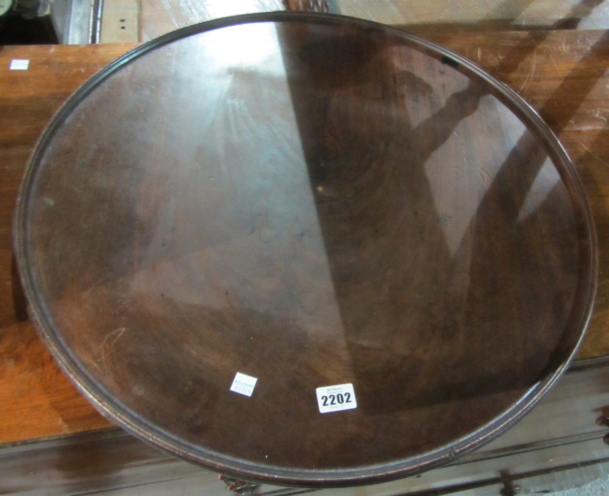 Appraisal: A th circular mahogany wooden tray