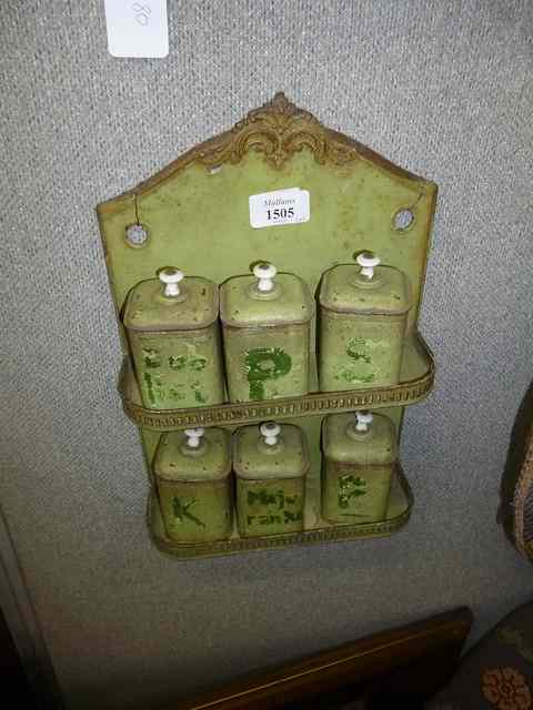 Appraisal: A CONTINENTAL GREEN PAINTED METAL SPICE RACK two tiers with