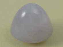 Appraisal: A loose polished star sapphire with pronounced star approx x