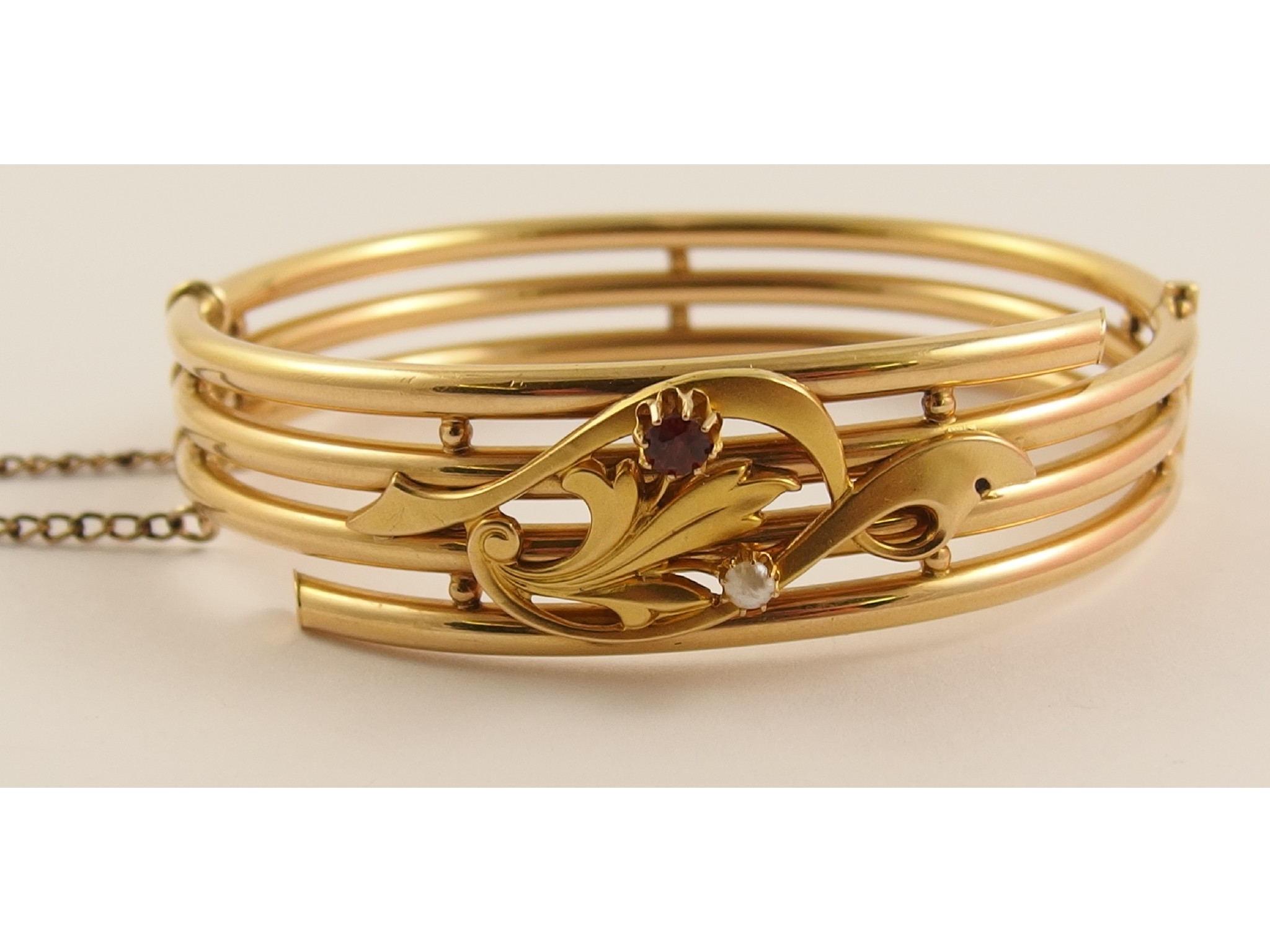 Appraisal: An ct Edwardian banglewith an Art Nouveau design to the