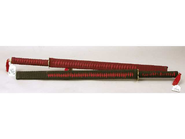 Appraisal: Set of two Modern Japanese style swords with scabbards Estimate