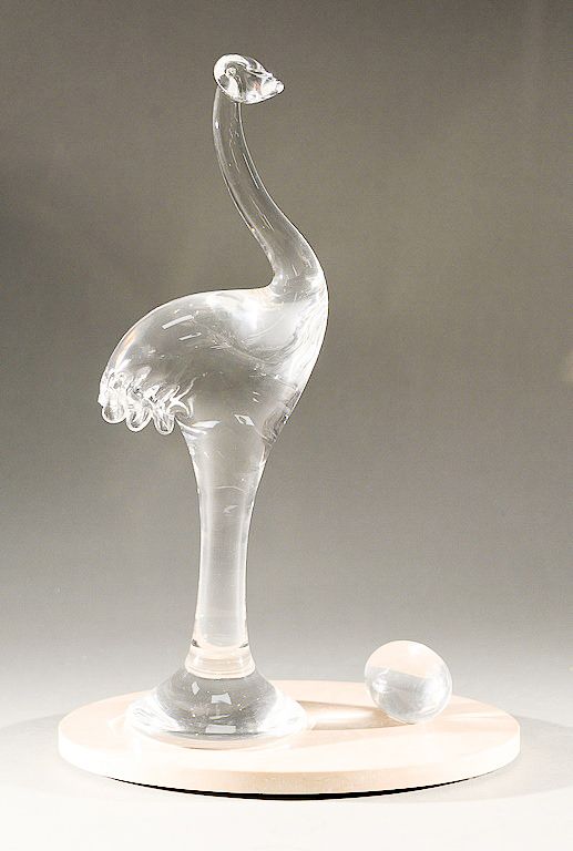 Appraisal: Steuben glass great ostrich with egg sculpture on travertine oval